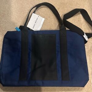 Last Day Issey Miyake NWT tote bag. Blue and black. Turquoise accent zipper.